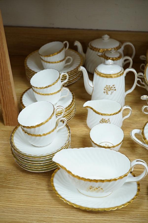 An extensive Minton ‘gold rose’ dinner and tea service. Condition - fair to good, tureen cracked